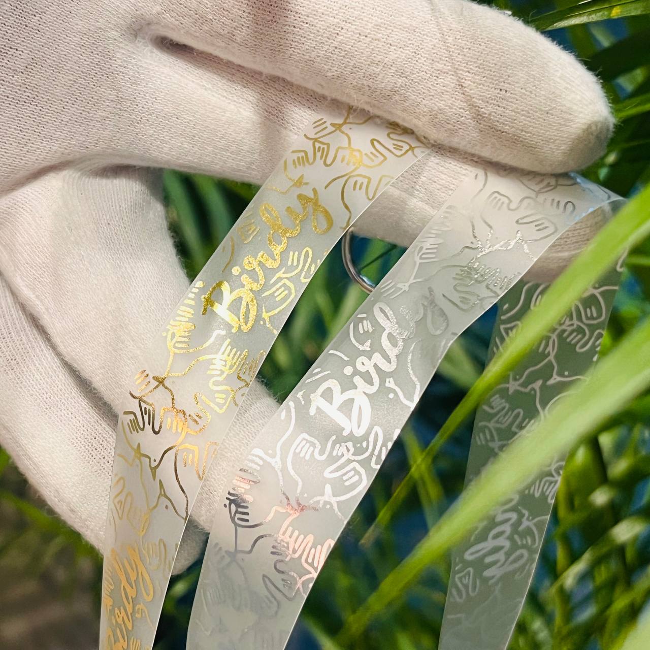 Прозрачная ленточка для бейджа с нанесением золотого и серебряного логотипа